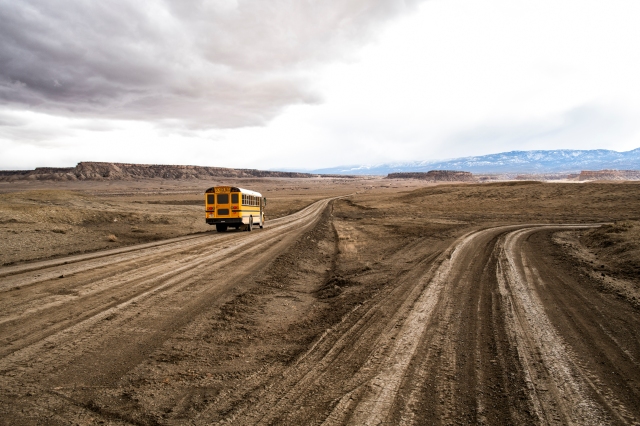 School bus on Indian Service Route 5010 near Sanostee, New Mexico